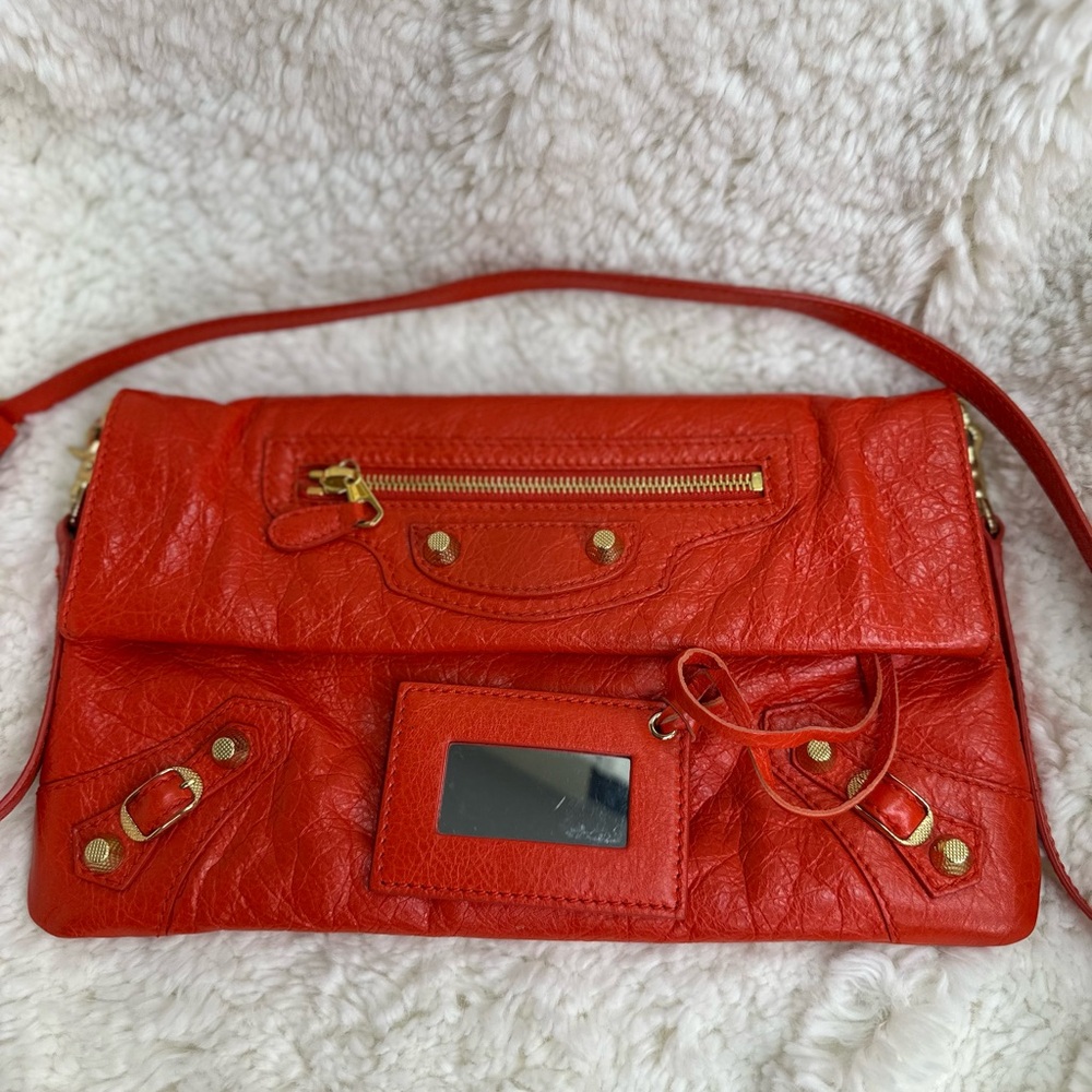 BALENCIAGA 
Agneau Giant 12 Gold Hardware Envelope Strap Clutch Rouge Coquelicot
